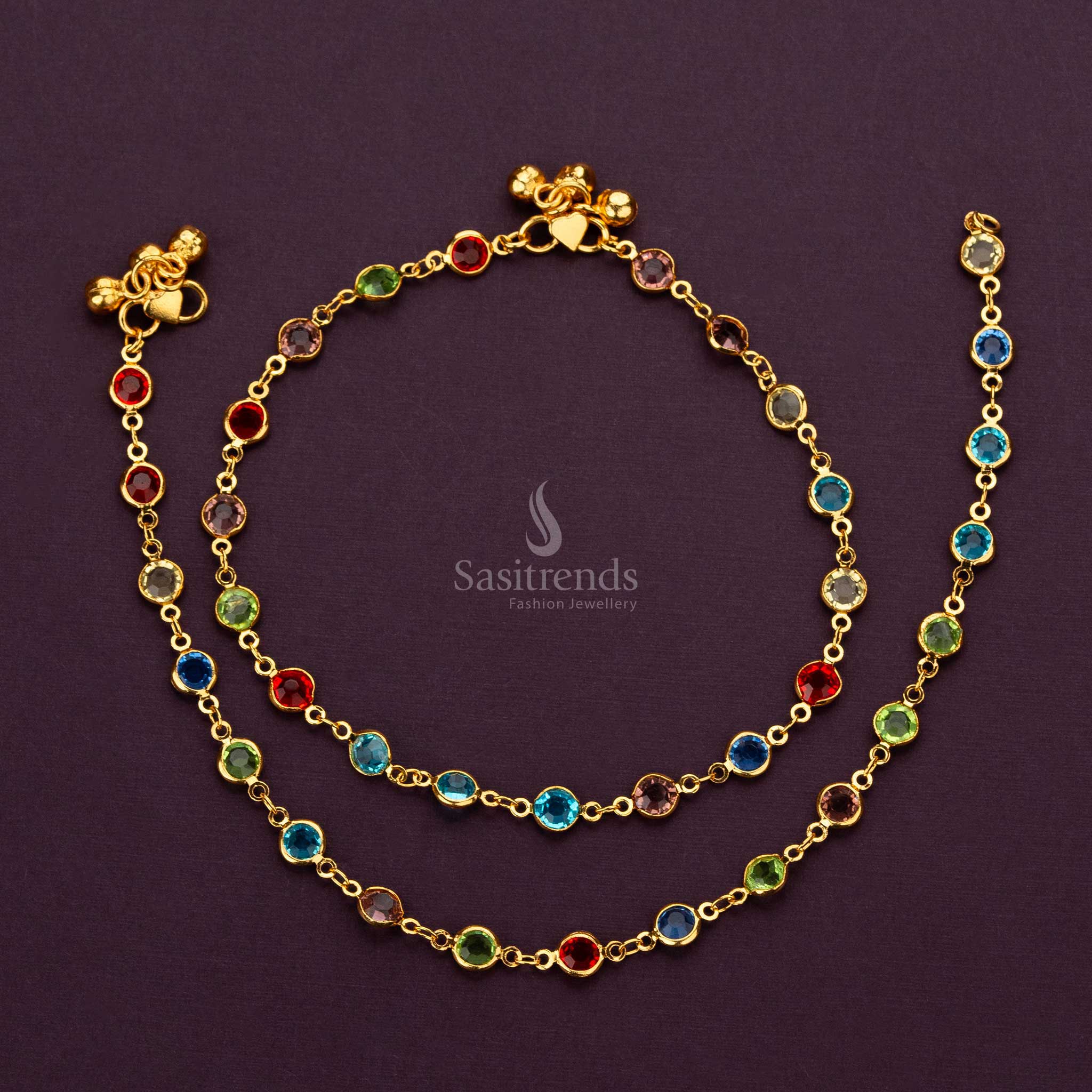 Elegant Navarathrana stone gold-plated anklets for women, perfect for traditional and modern outfits - Sasitrends