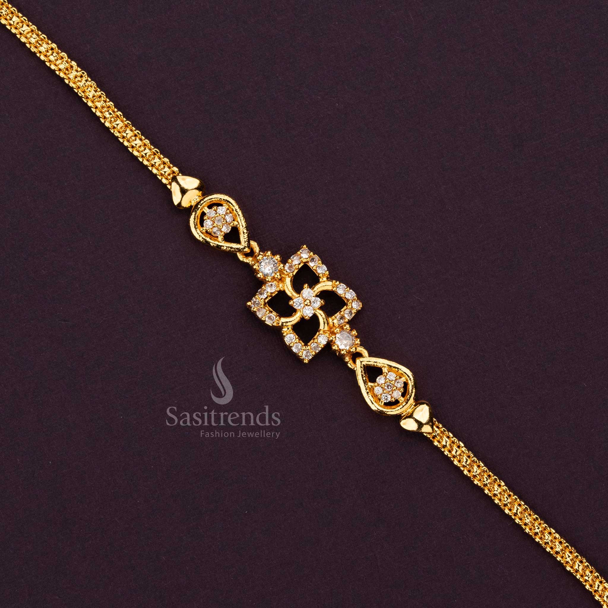 Elegant micro gold-plated bracelet with detailed floral motifs and fine craftsmanship, adding a touch of sophistication to any ensemble - Sasitrends