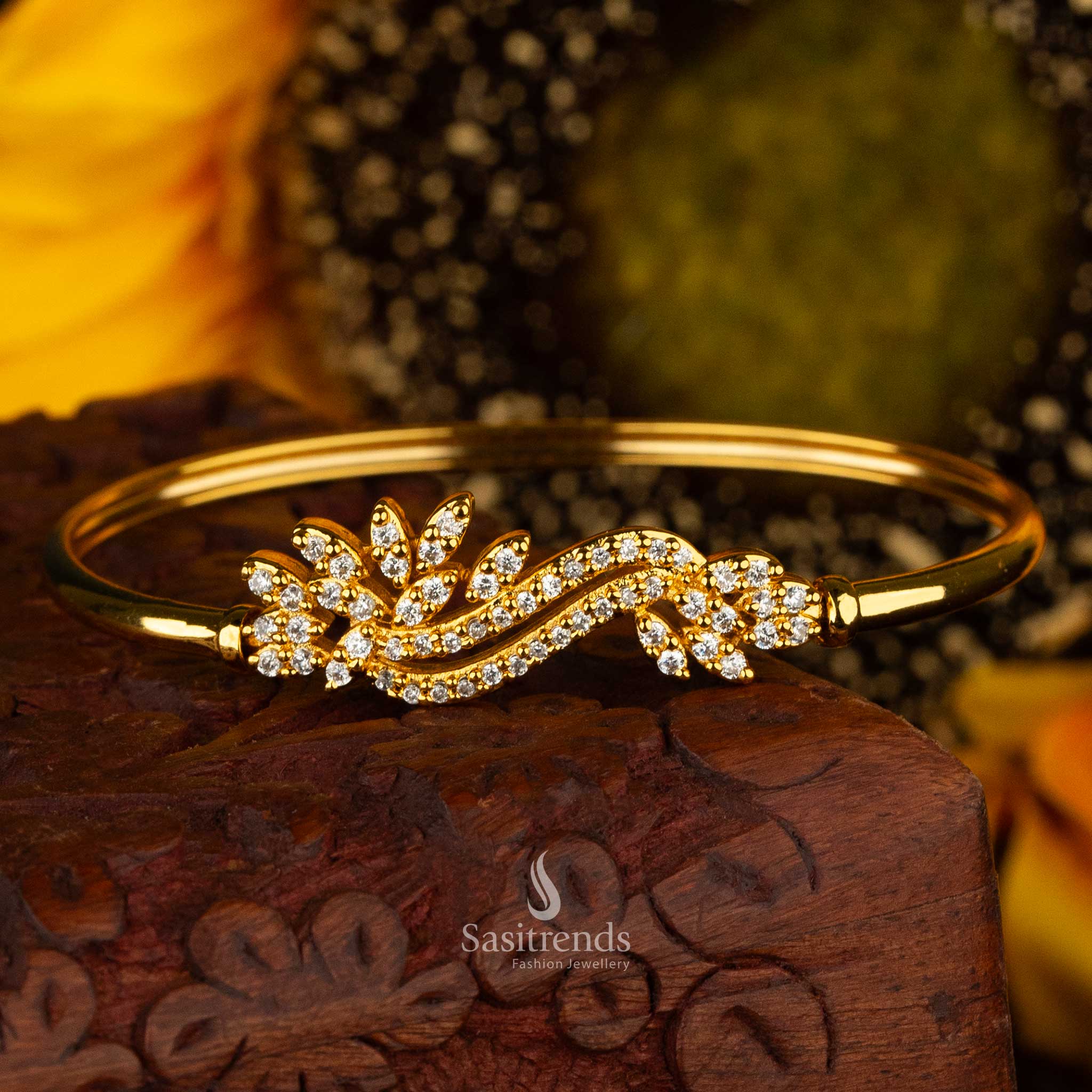 Elegant openable bracelet with floral white American Diamond design and micro gold plating - Sasitrends