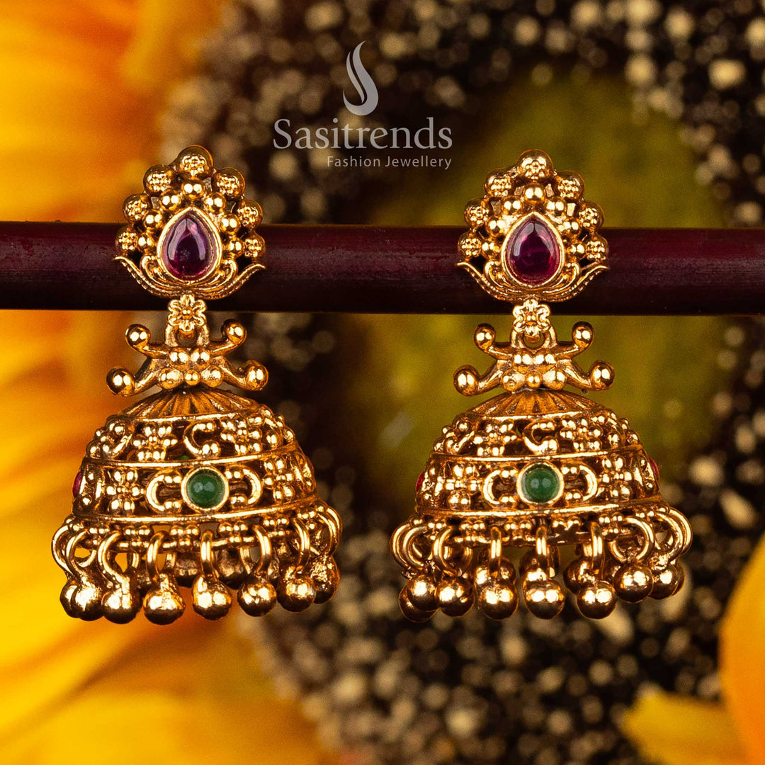 Delicate green studded  temple jhumka earrings for celebrations - Sasitrends





