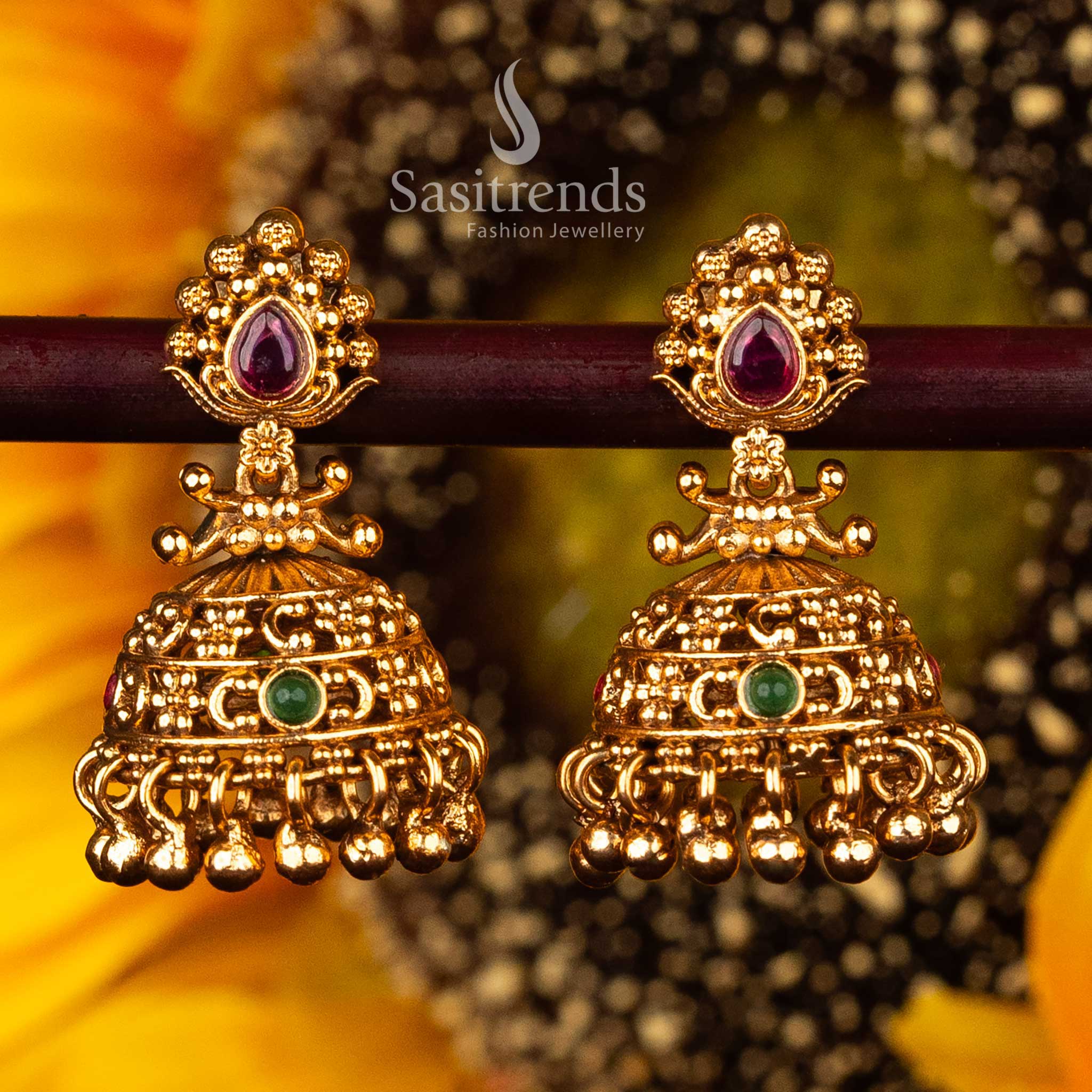 Delicate green studded  temple jhumka earrings for celebrations - Sasitrends





