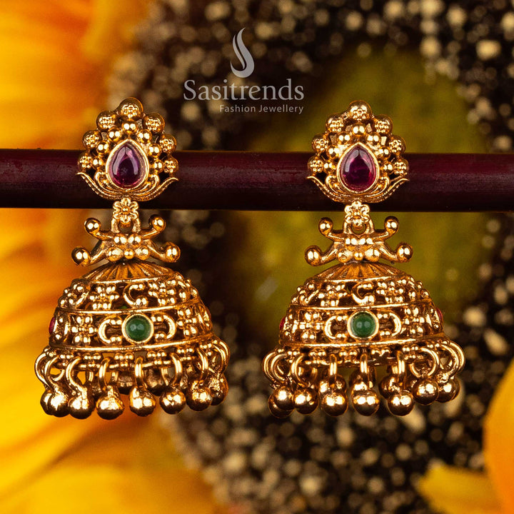 Delicate green studded  temple jhumka earrings for celebrations - Sasitrends





