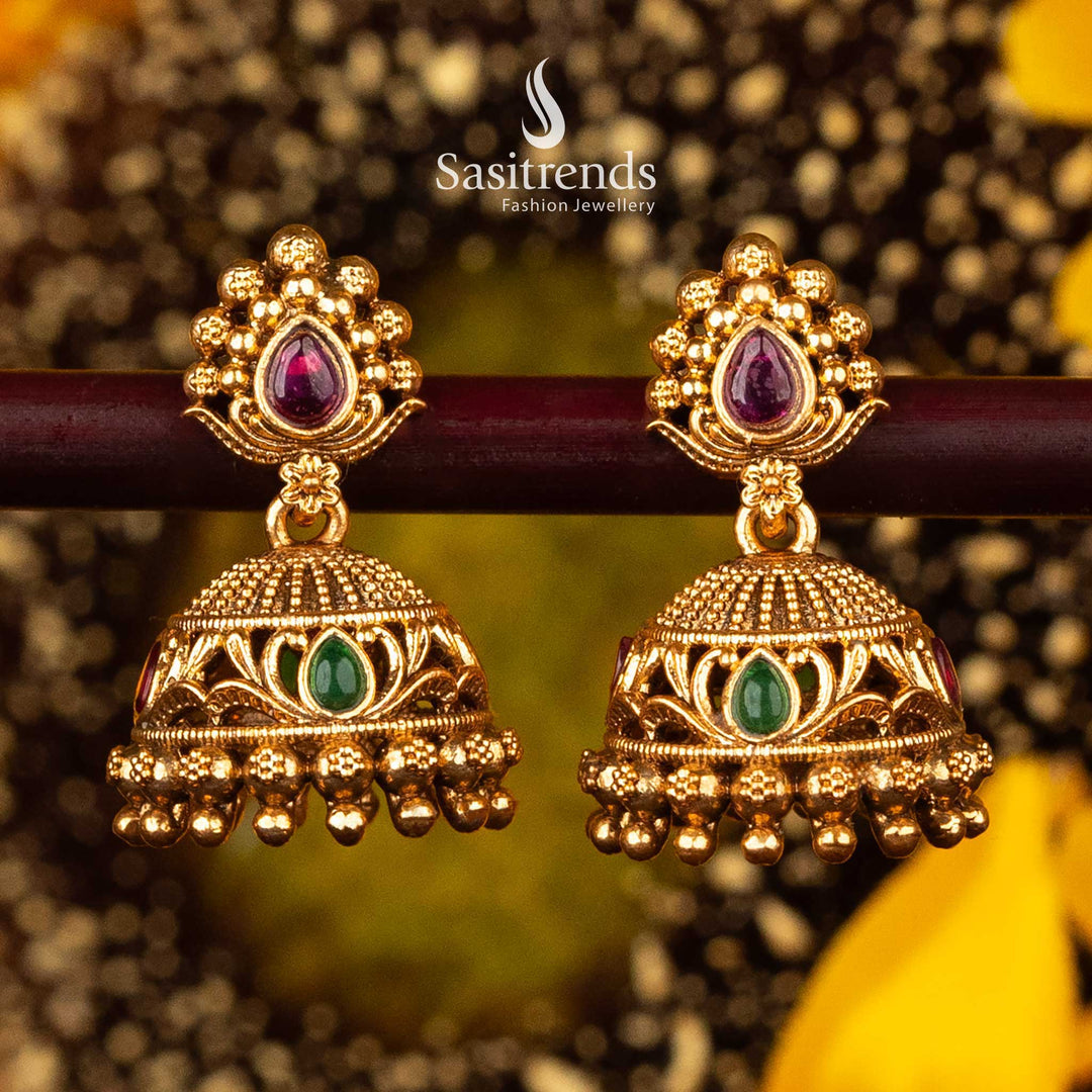 Ruby and green temple jhumka earrings with gold bead hangings for special occasions - Sasitrends