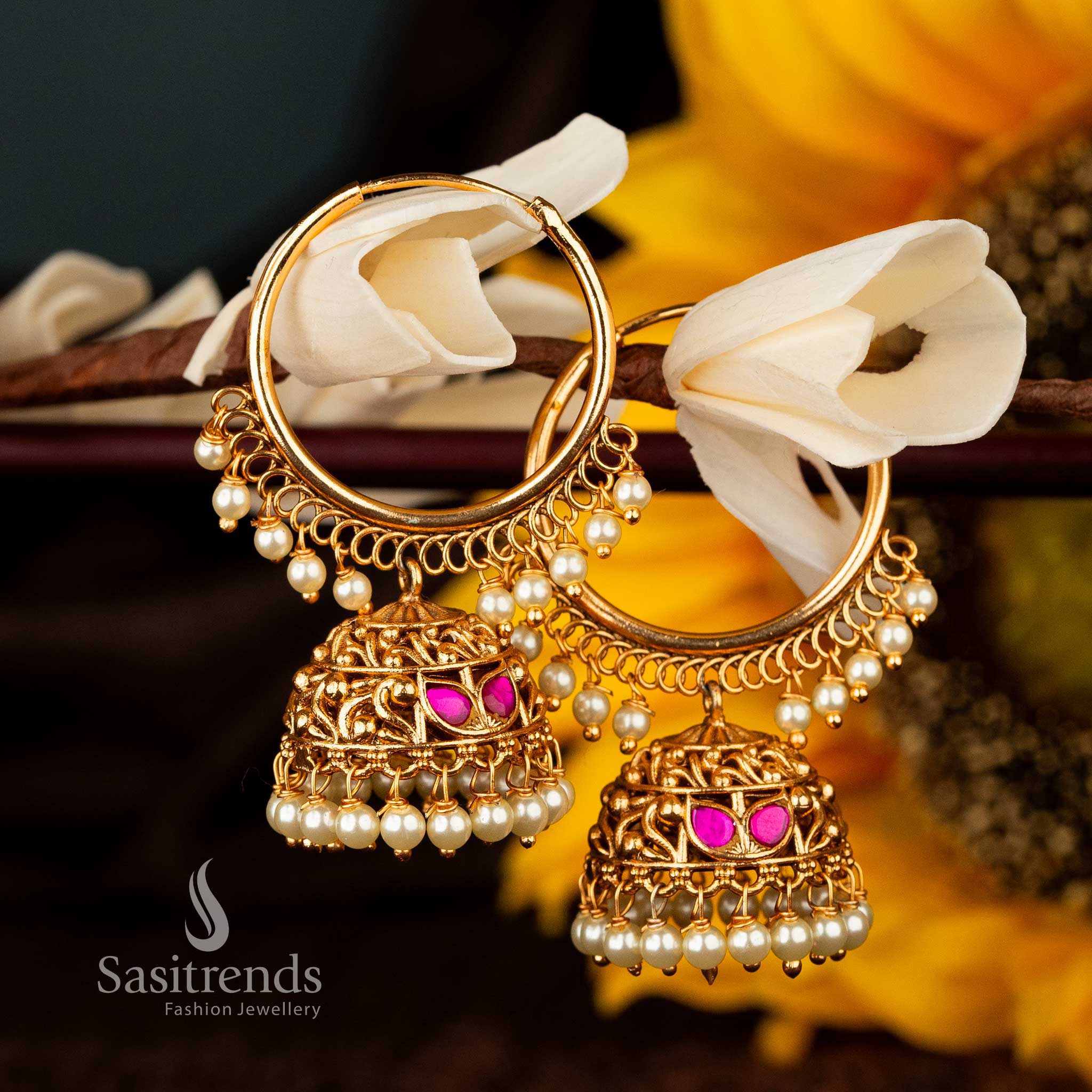 Ethnic ruby jhumka earrings featuring delicate pearl ball accents - Sasitrends