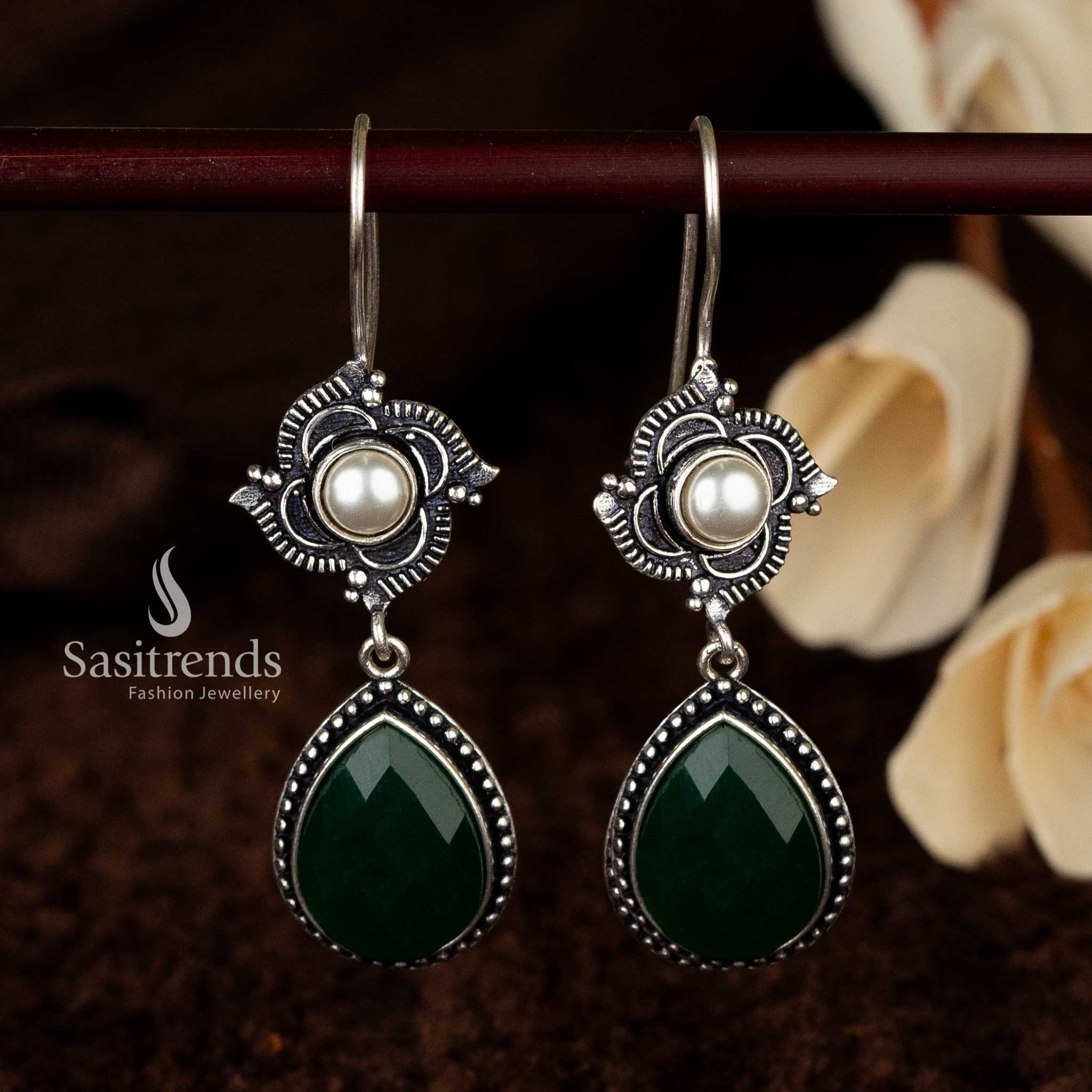 Vintage-inspired green gemstone earrings with floral oxidised finish - Sasitrends