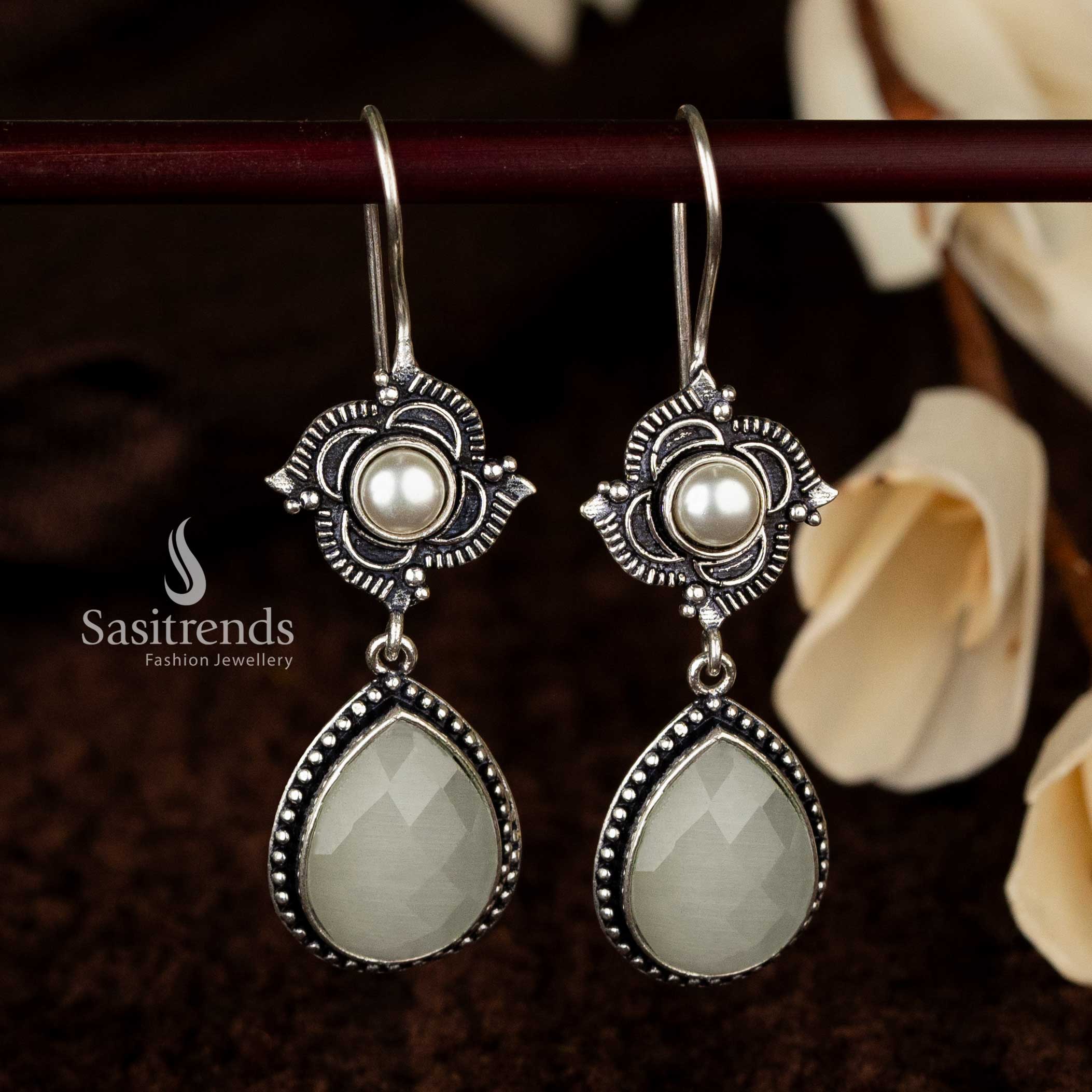 Radiant white teardrop oxidised earrings with elegant pearls - Sasitrends