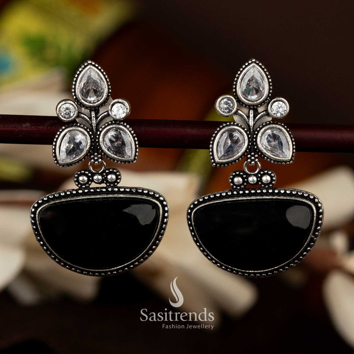 Oxidised silver earrings with black half-moon drop and floral accents - Sasitrends