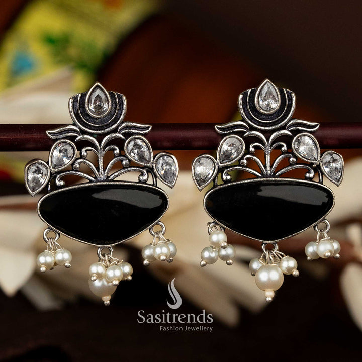 Black and White oxidised silver earrings with lotus design and delicate pearl accents - Sasitrends