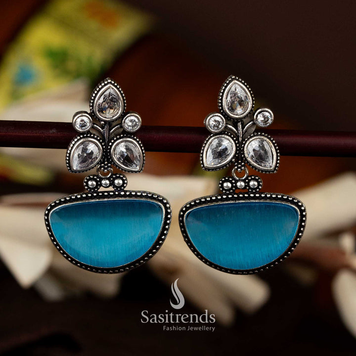 Oxidised silver earrings with sky blue half-moon drop and floral details - Sasitrends