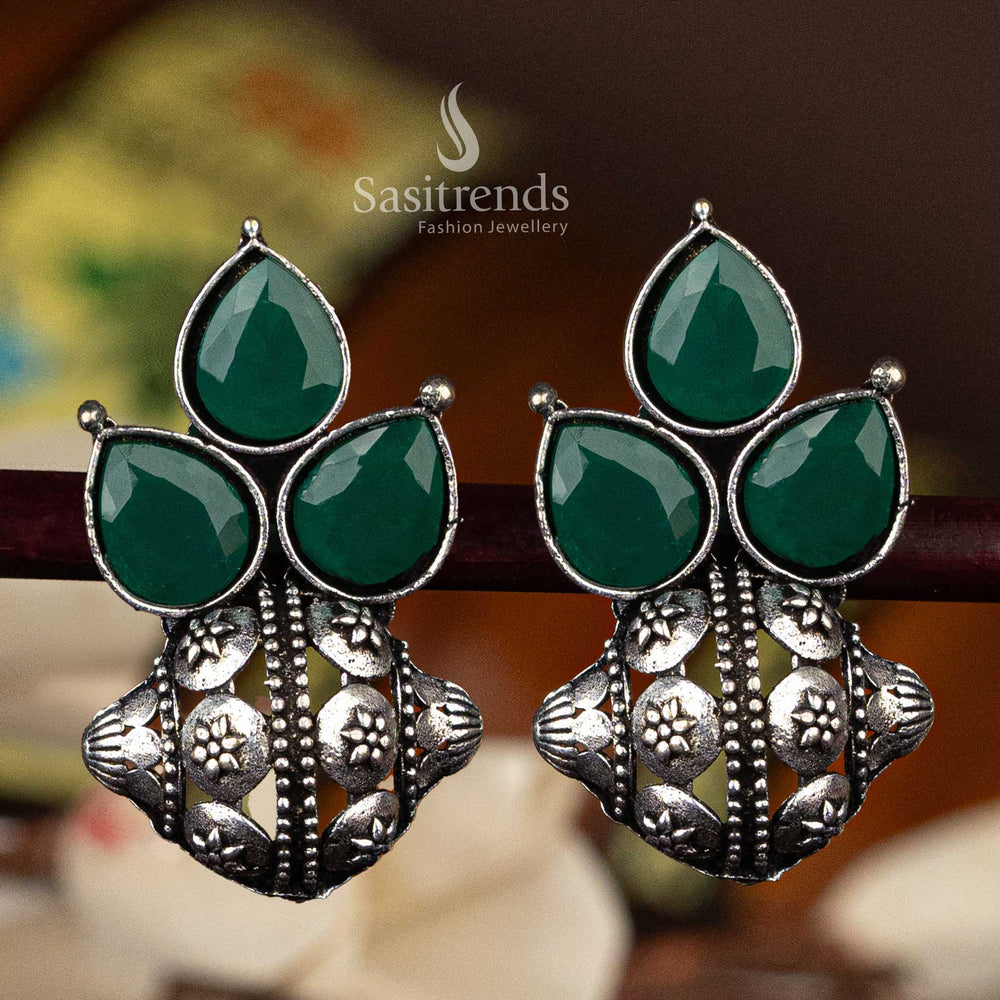 Green pear-shaped stone oxidised silver earrings with intricate floral pattern - Sasitrends