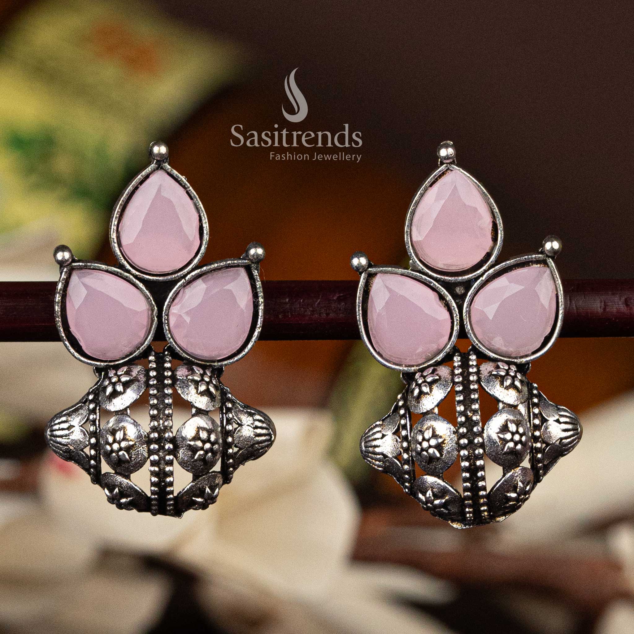 Classic oxidised silver earrings with pink pear-shaped stones and floral design  - Sasitrends