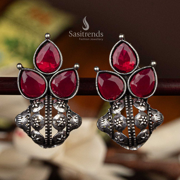 Oxidised silver earrings with Ruby  pear-shaped stones and floral motif  - Sasitrends