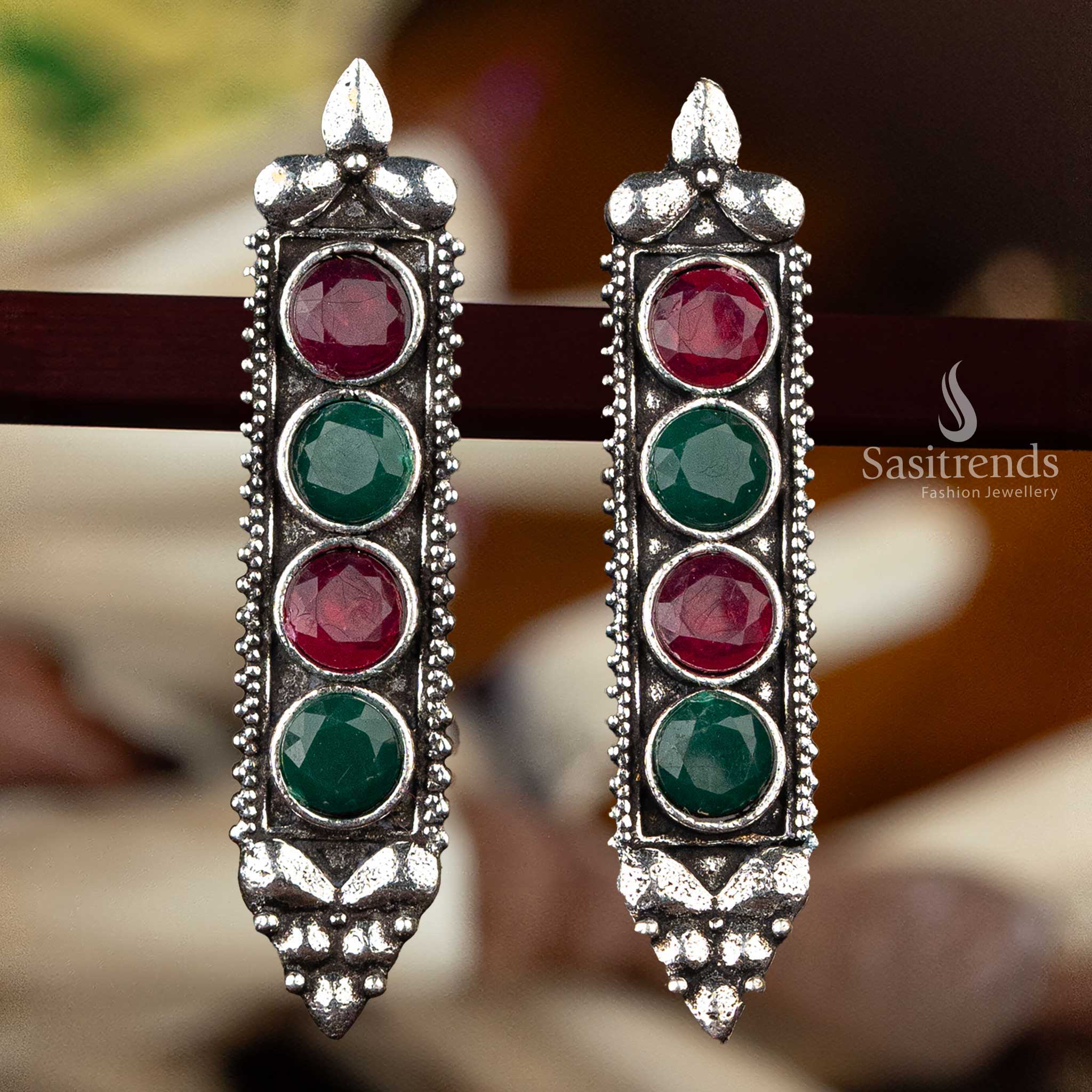  Ruby and green stone oxidised silver earrings in elongated design - Sasitrends