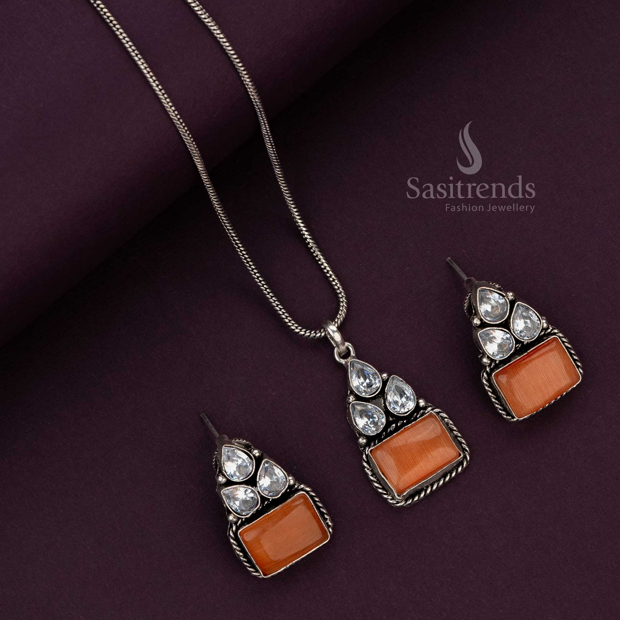 Elegant oxidised pendant chain set with Dark Pink stones and twisted motifs - Sasitrends