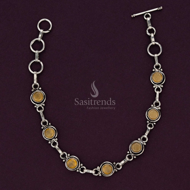 Yellow stone oxidised bracelet with detailed silver craftsmanship - Sasitrends