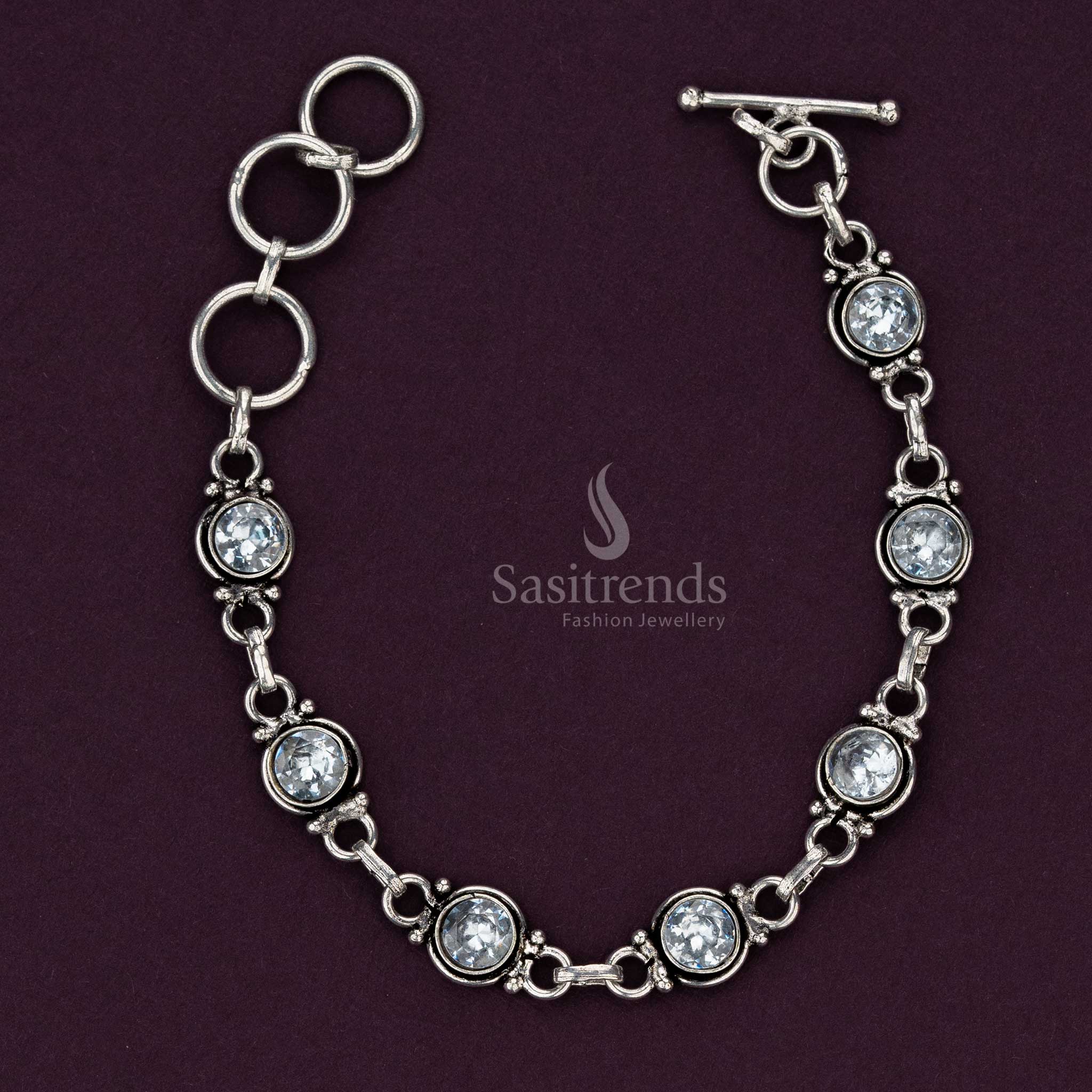 White oxidised bracelet with clear stones and intricate details - Sasitrends