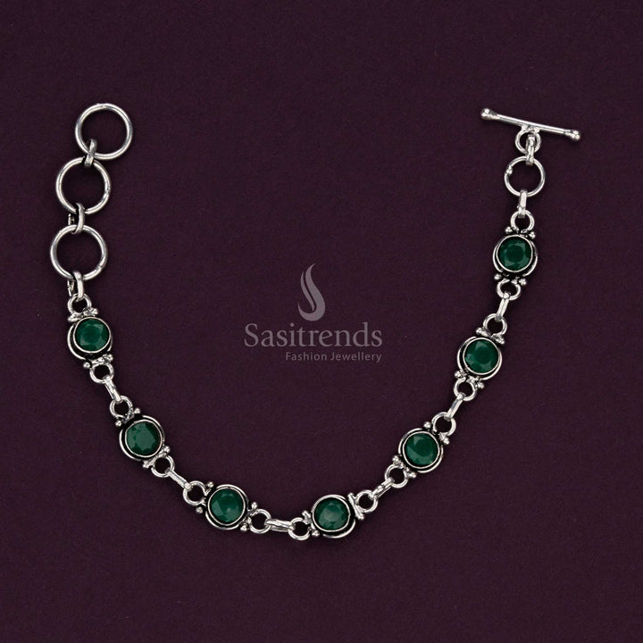 Green stone oxidised bracelet with detailed silver craftsmanship - Sasitrends