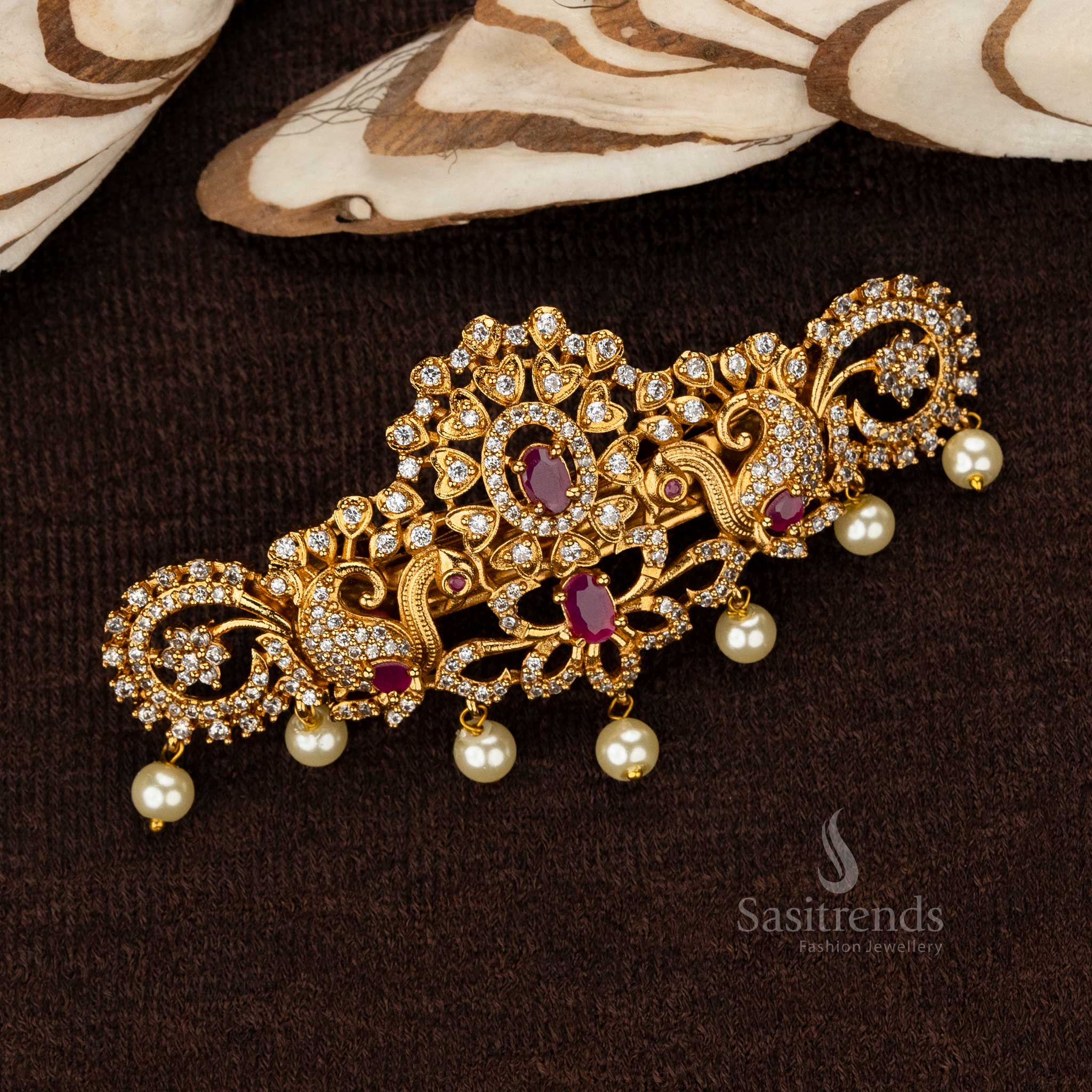 Bridal hair clip with white-ruby oval stone and intricate floral motifs - Sasitrends