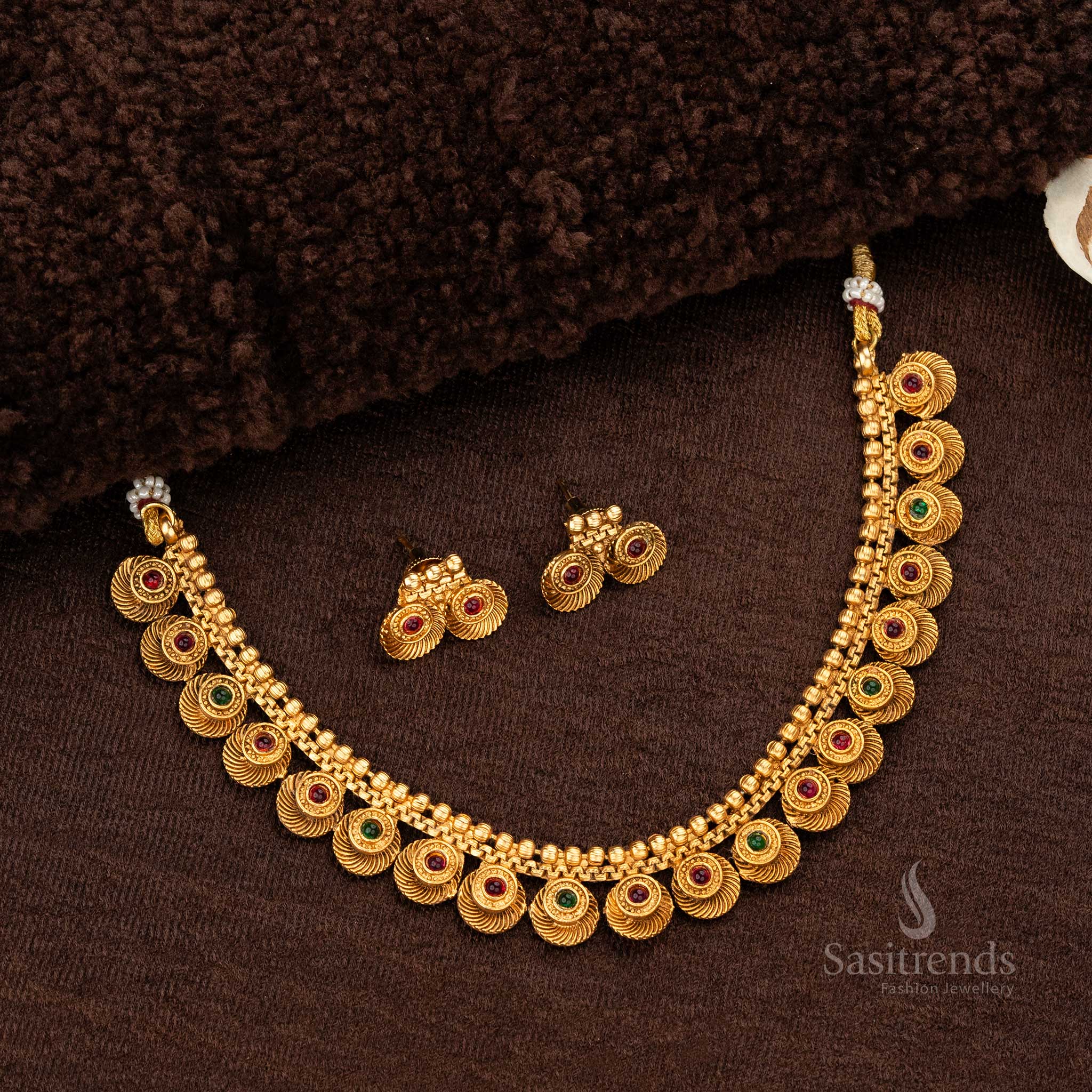 Round design matte gold-plated temple necklace set with ruby and green synthetic stones and matching earrings - Sasitrends