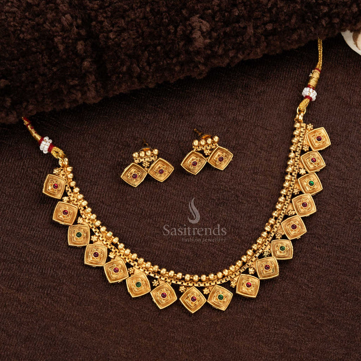 Square pendant layered matte gold temple necklace set adorned with ruby and green stones, paired with matching square-shaped earrings - Sasitrends