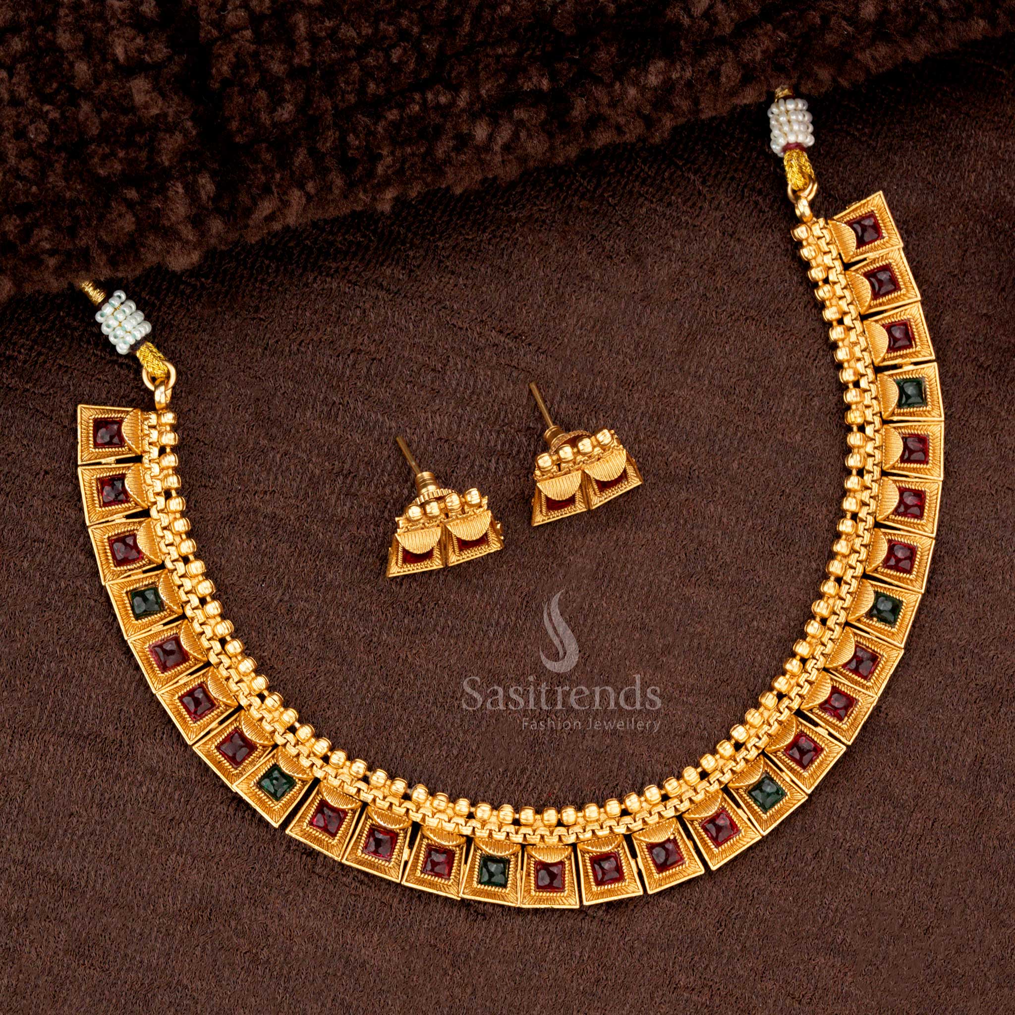 Classic temple matte gold plated necklace set with ruby and green stone motifs - Sasitrends