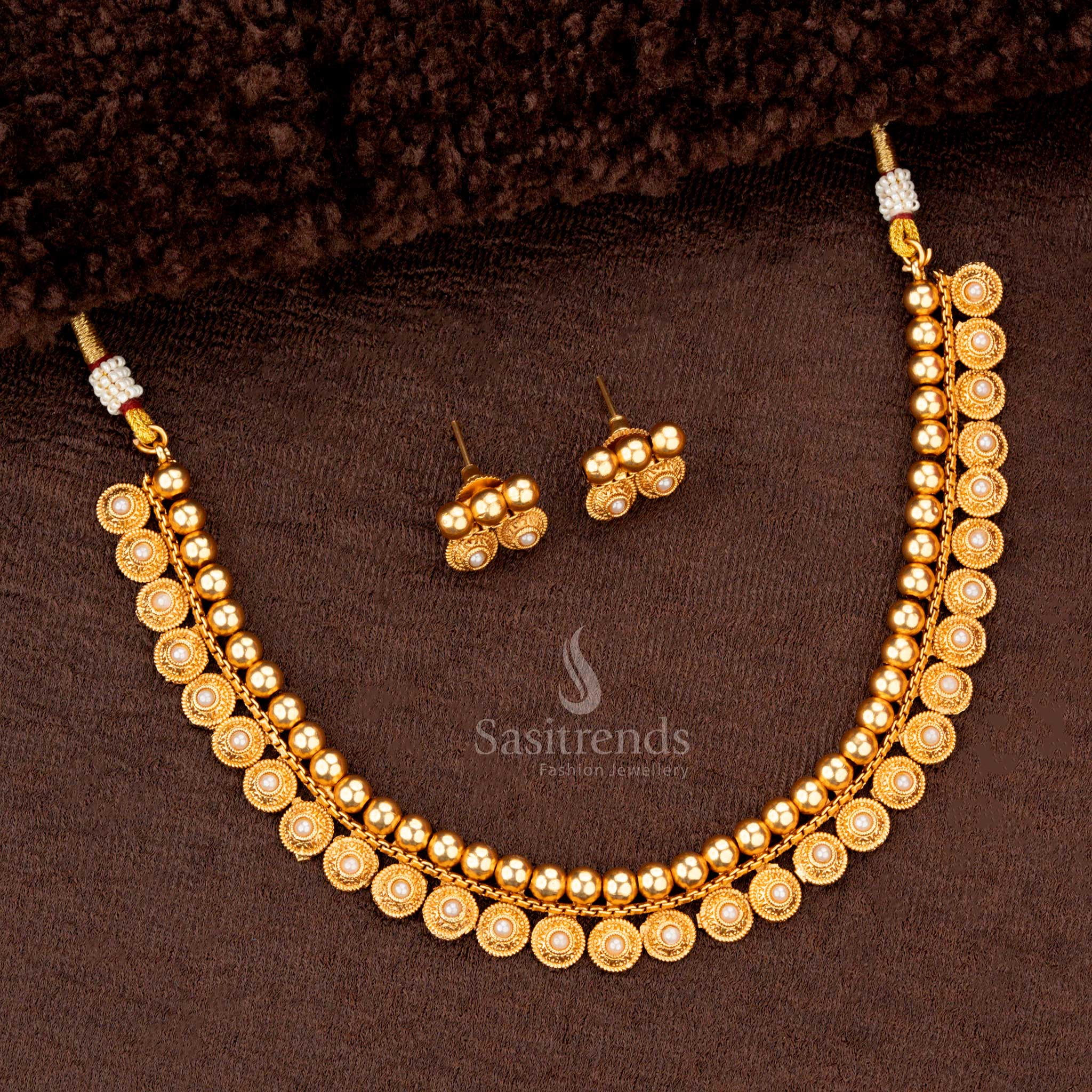 Pearl circular motif necklace set  with an elegant design and matching earrings - Sasitrends