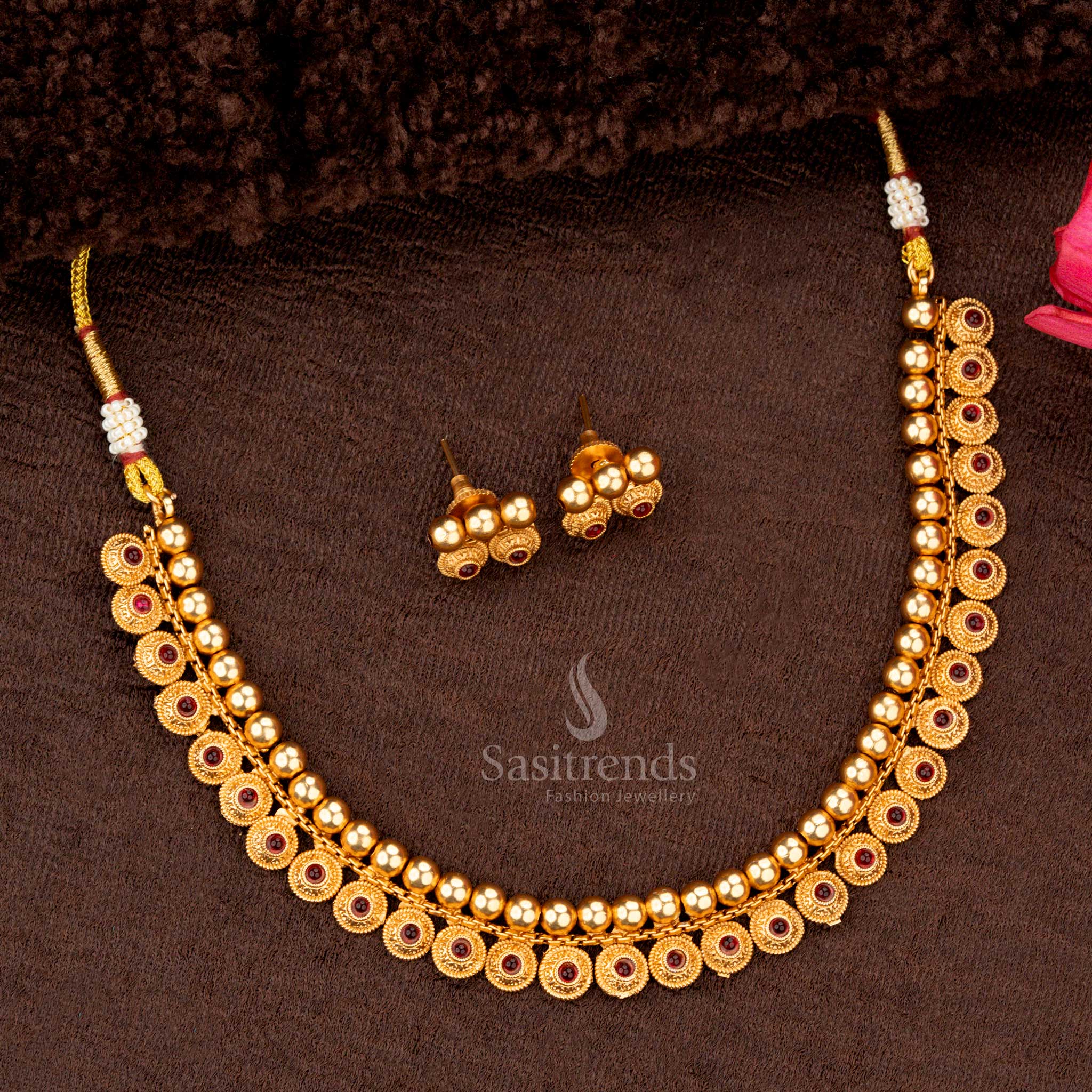 Ruby motif necklace set with intricate circular designs and matching earrings  - Sasitrends