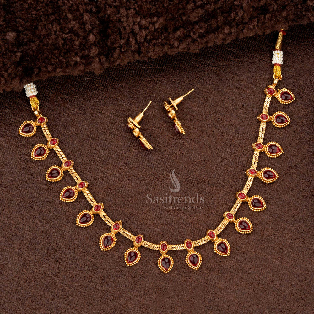 Elegant ruby drop-motif temple jewellery in matte gold finish - Sasitrends