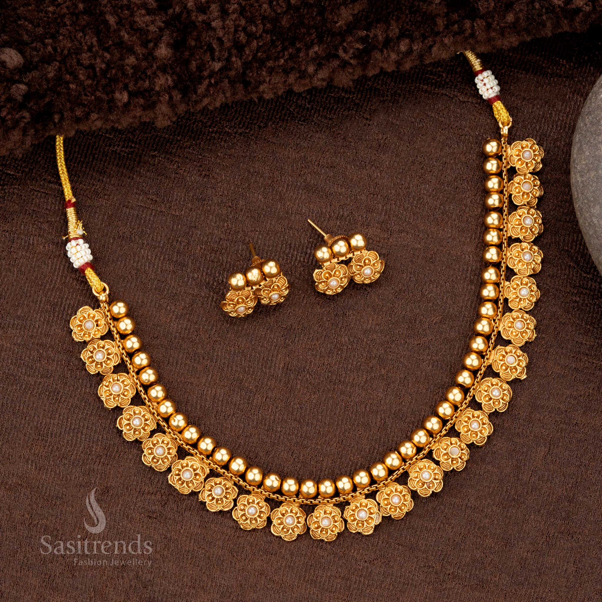 Matte gold temple necklace with flower motifs and pearl embellishments - Sasitrends