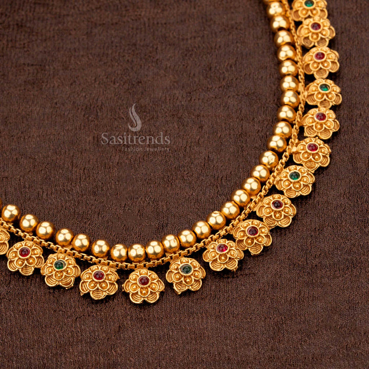 Festive temple necklace with ruby-green flower motifs and gold bead detailing - Sasitrends