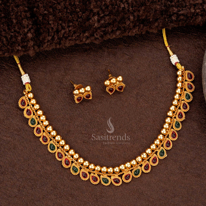 Festive temple necklace with ruby-green teardrop designs and gold bead embellishments - Sasitrends