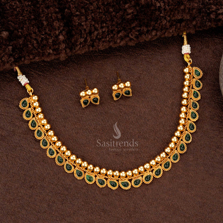 Temple necklace featuring green teardrop motifs with gold bead detailing - Sasitrends