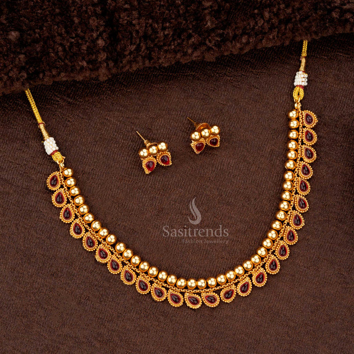 Exquisite temple necklace with ruby teardrop motifs and polished gold beads - Sasitrends