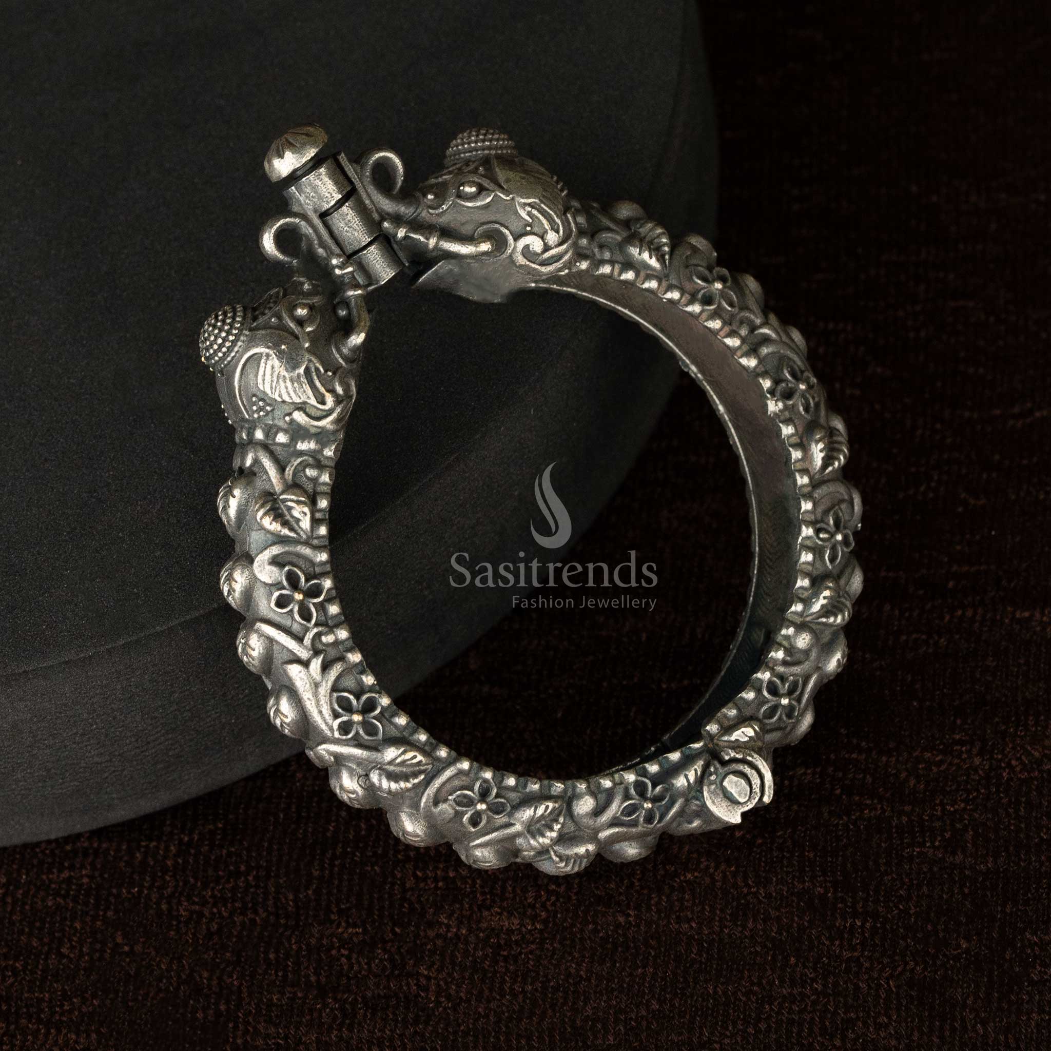 Floral engraved oxidised kada bangle with ornate details - Sasitrends