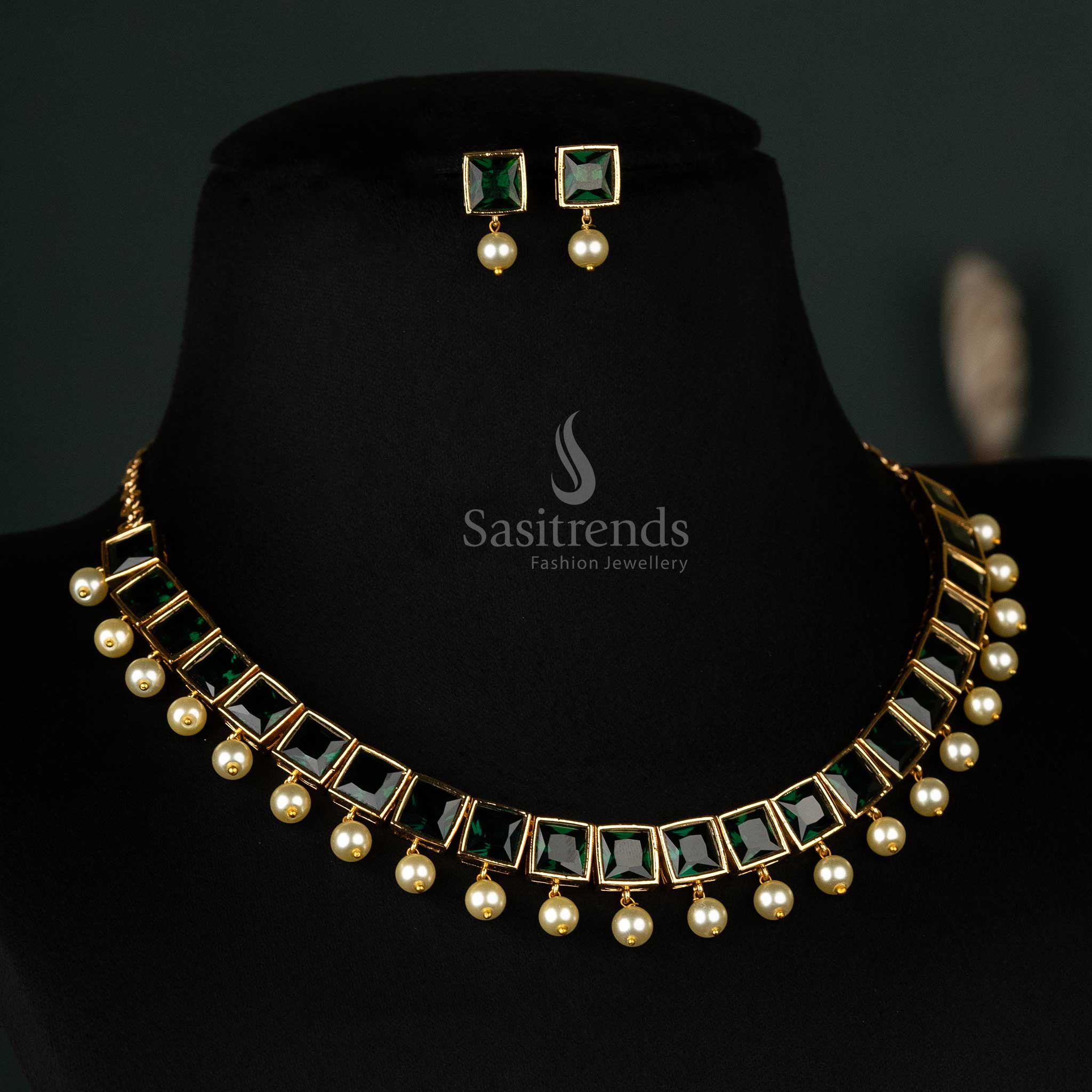 Radiant American Diamond micro gold-plated necklace with pearl hanging and big green square stones, exuding elegance for festive and formal occasions - Sasitrends