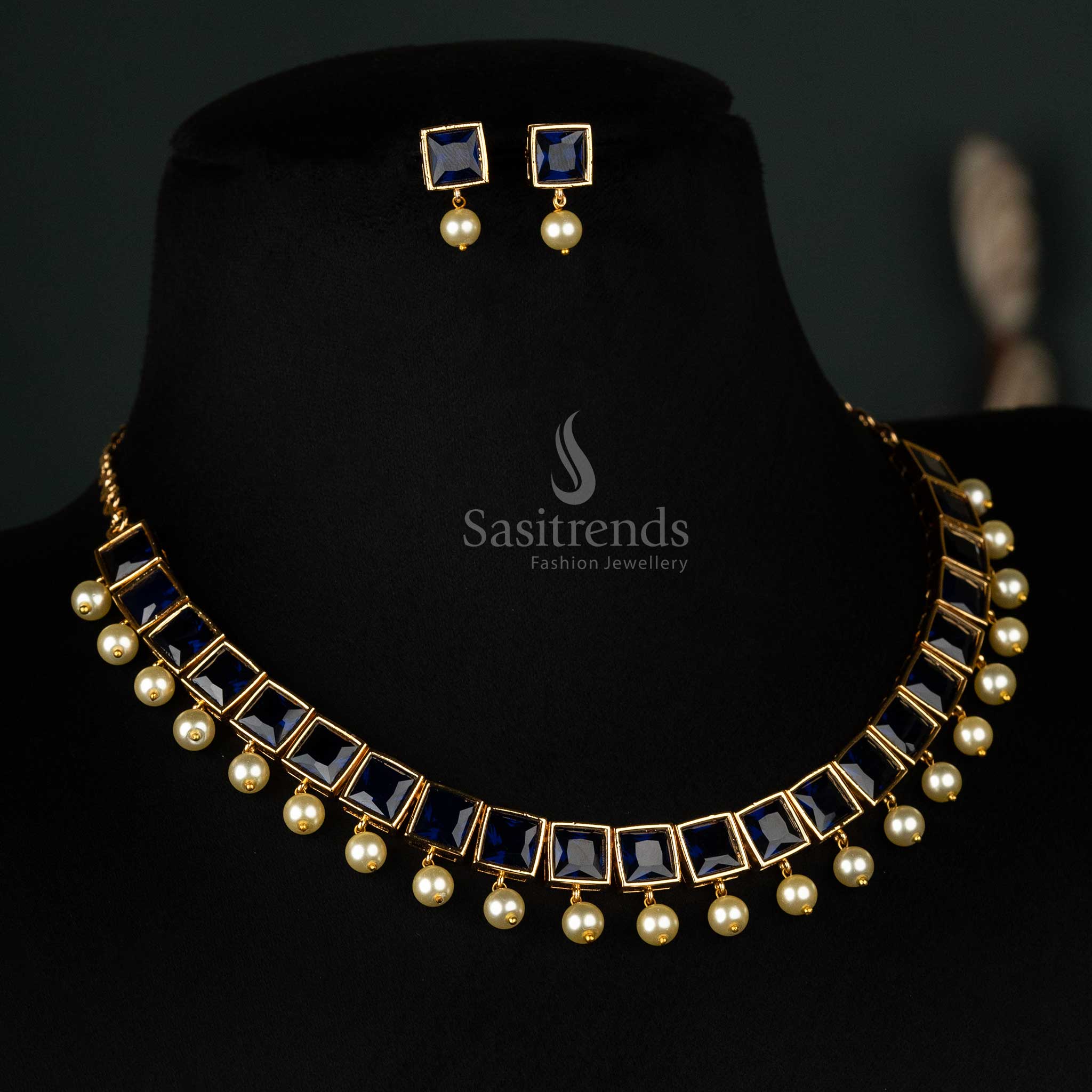 Exquisite American Diamond micro gold-plated necklace jewellery set with pearl hanging, adorned with big blue square stones for a royal and graceful statement - Sasitrends