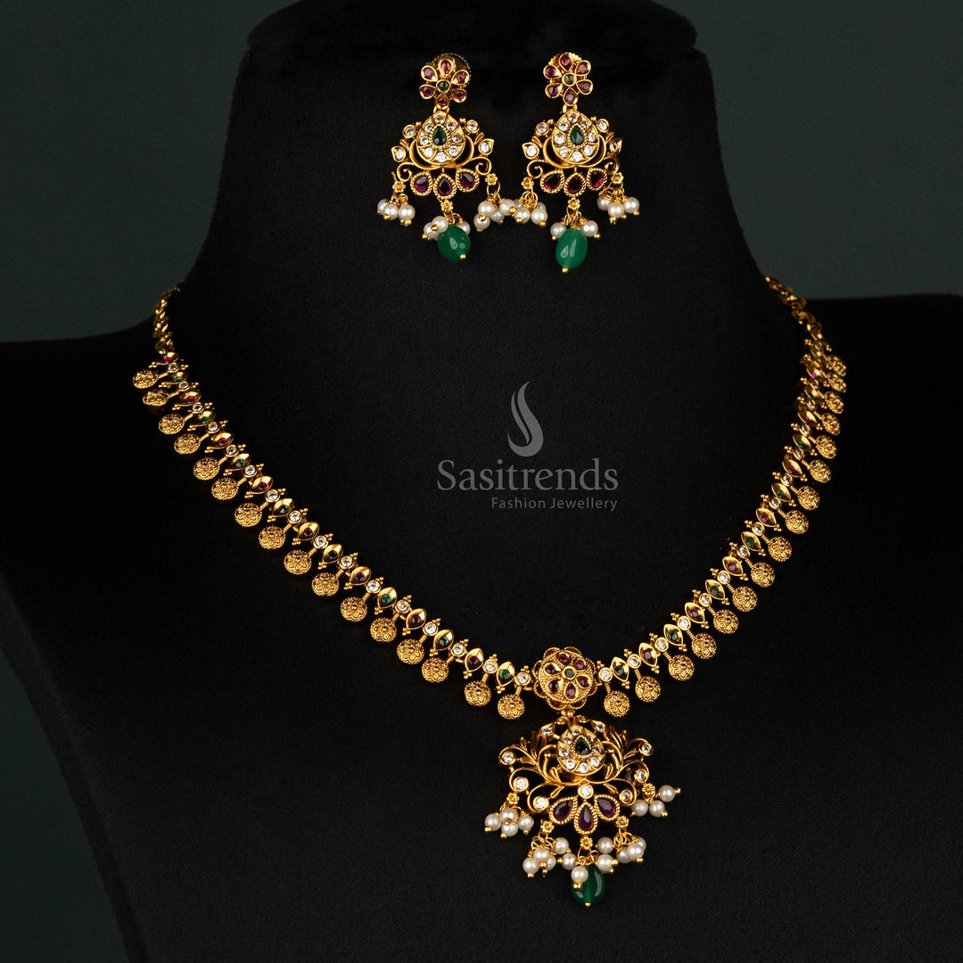 Vibrant temple matte gold-plated jewellery set featuring ruby-green stones and intricate floral details, perfect for bridal wear - Sasitrends