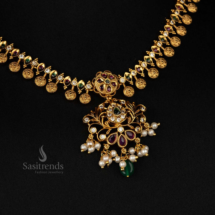 Heritage-inspired matte gold temple jewellery set with ruby-green accents and intricate floral designs for festive occasions - Sasitrends