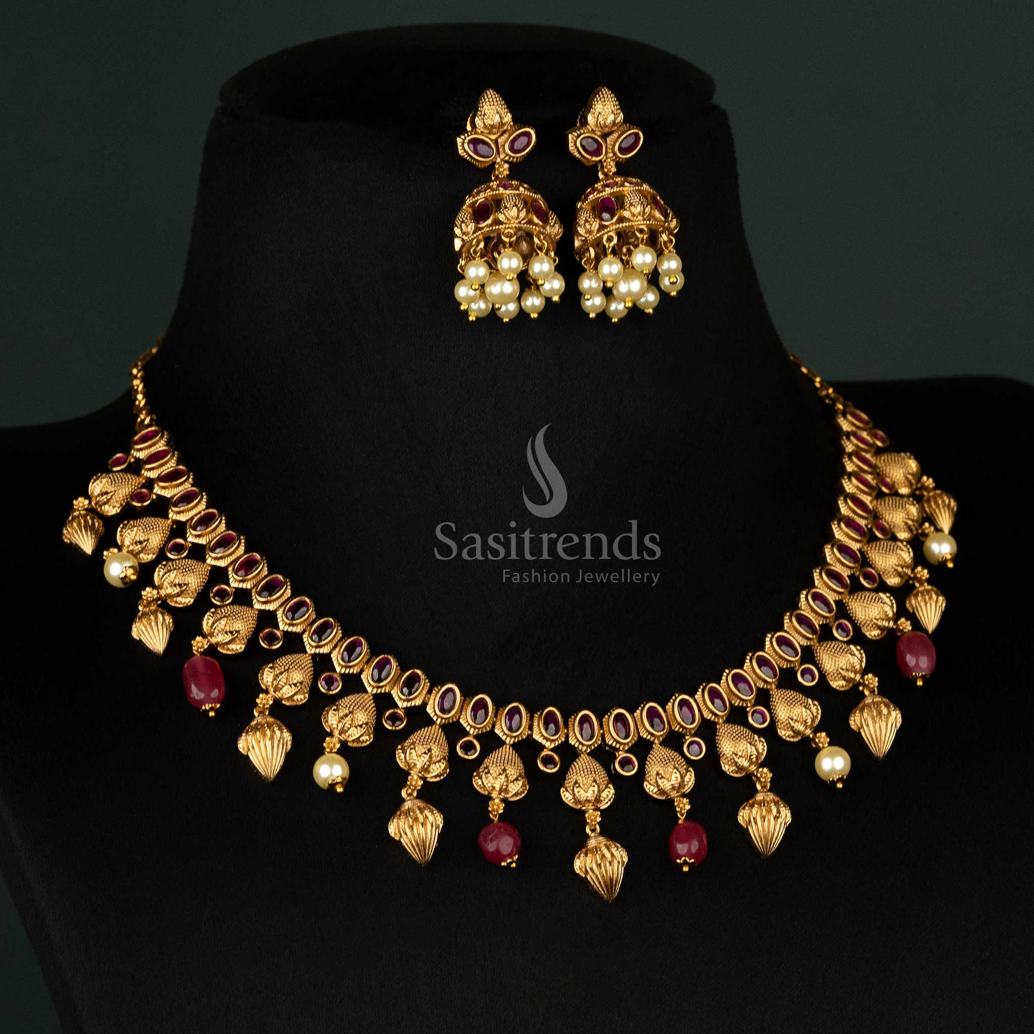 Traditional matte gold bridal necklace set adorned with temple motifs, ruby stones, and lustrous pearls for a timeless look - Sasitrends