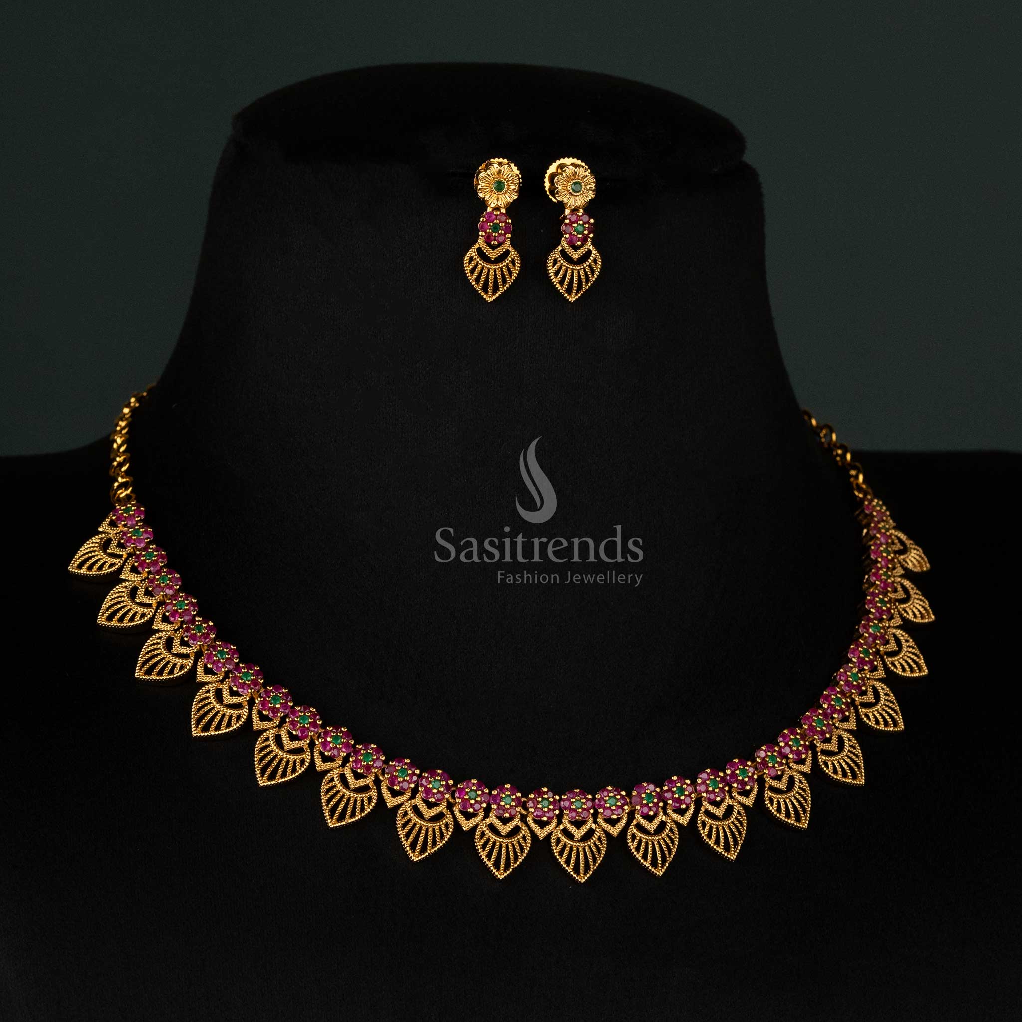 Ethnic wear floral and leaf motif matte gold necklace set with sparkling AD stones – Sasitrends