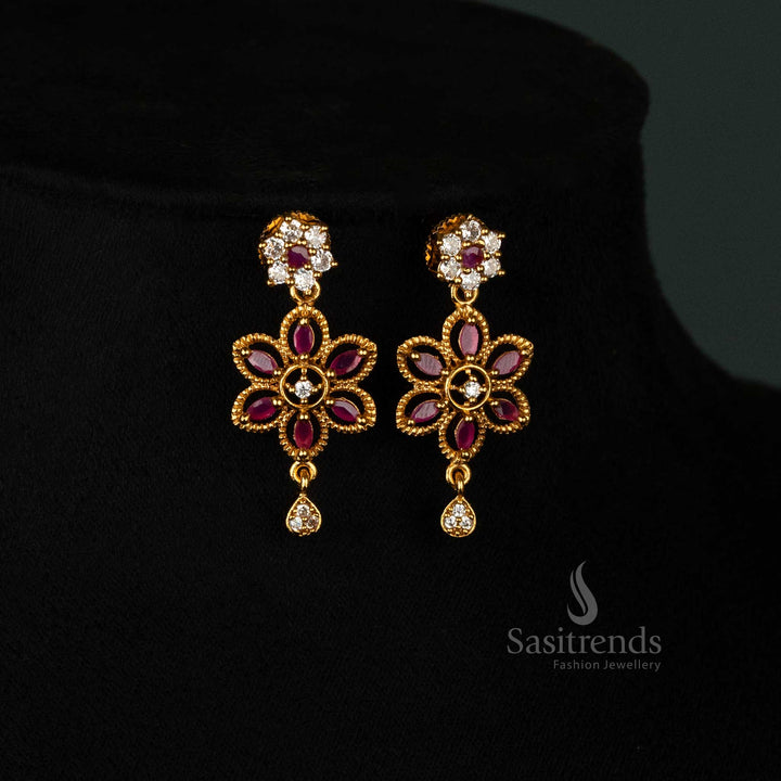 Spectacular floral swirl matte gold plated earringsset with radiant white-ruby AD stones, exquisite drop pendant, and luxurious earrings - Sasitrends