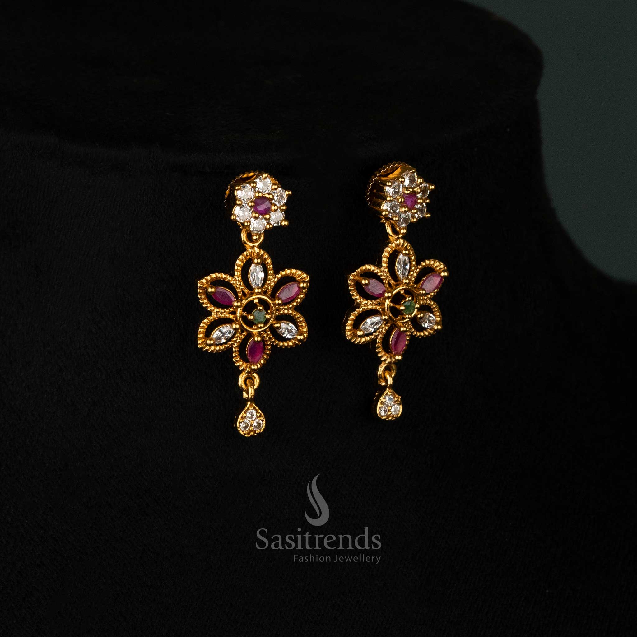 Intricately designed floral swirl matte gold plated earrings set decorated with dazzling multi-color stones, a sophisticated drop pendant, and luxurious earrings - Sasitrends