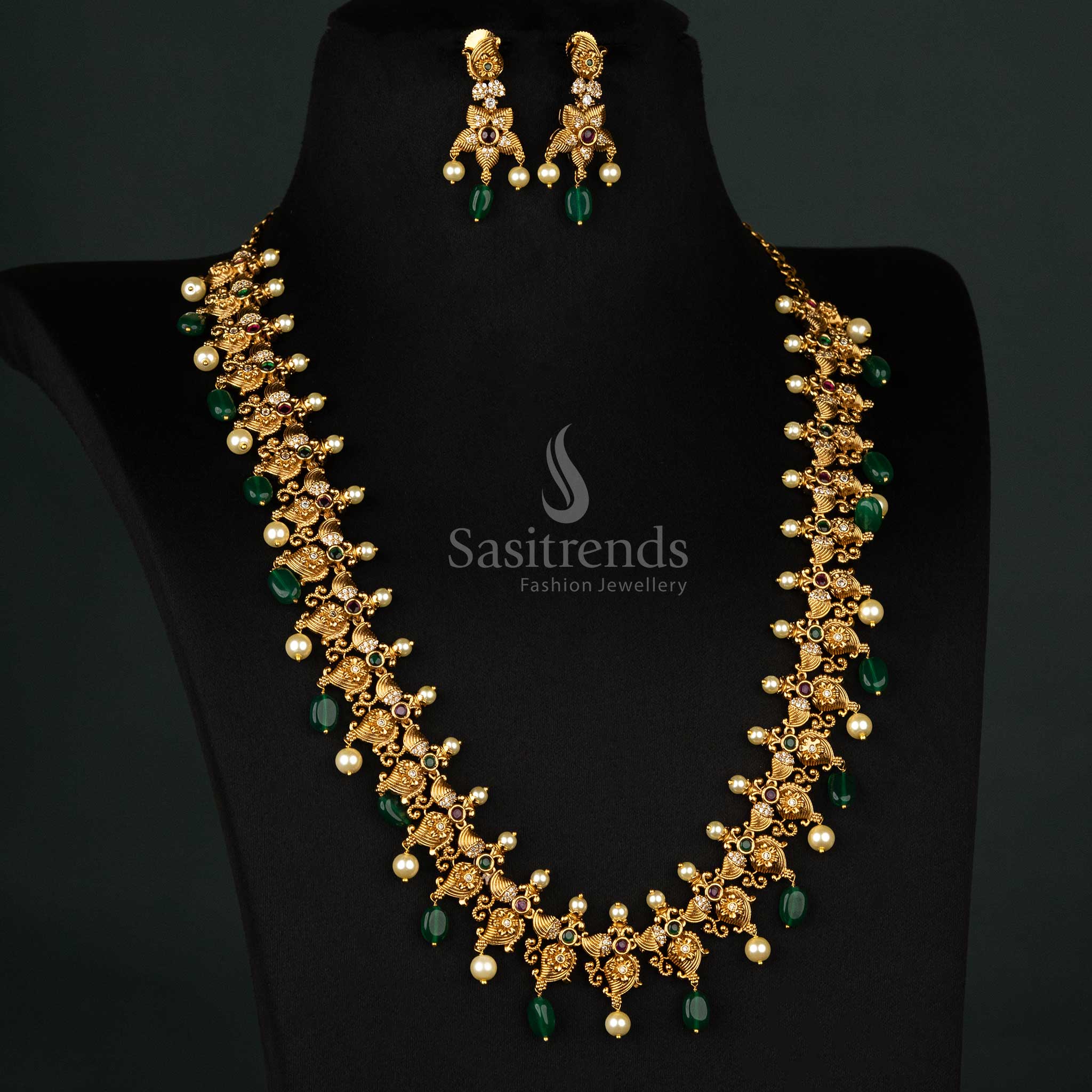 Premium matte gold-plated temple jewellery set with stunning AD stones, green beads, and intricate craftsmanship - Sasitrends