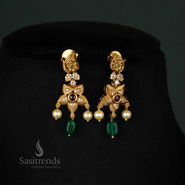 Traditional temple jewellery set with matte gold plating, featuring mango motifs, green beads, and pearl embellishments - Sasitrends