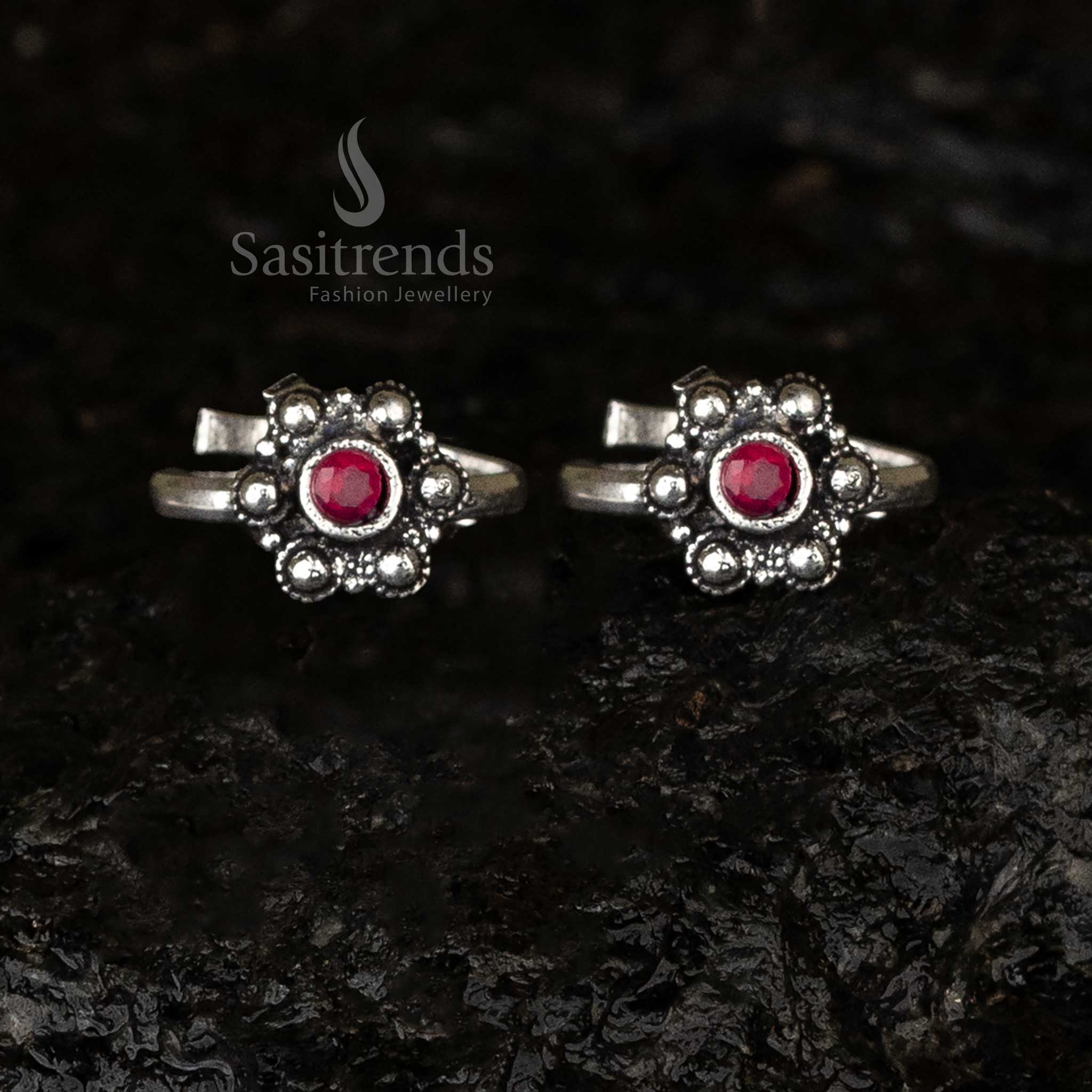 Calming oxidised ruby round toe ring with floral bead design and adjustable band - Sasitrends