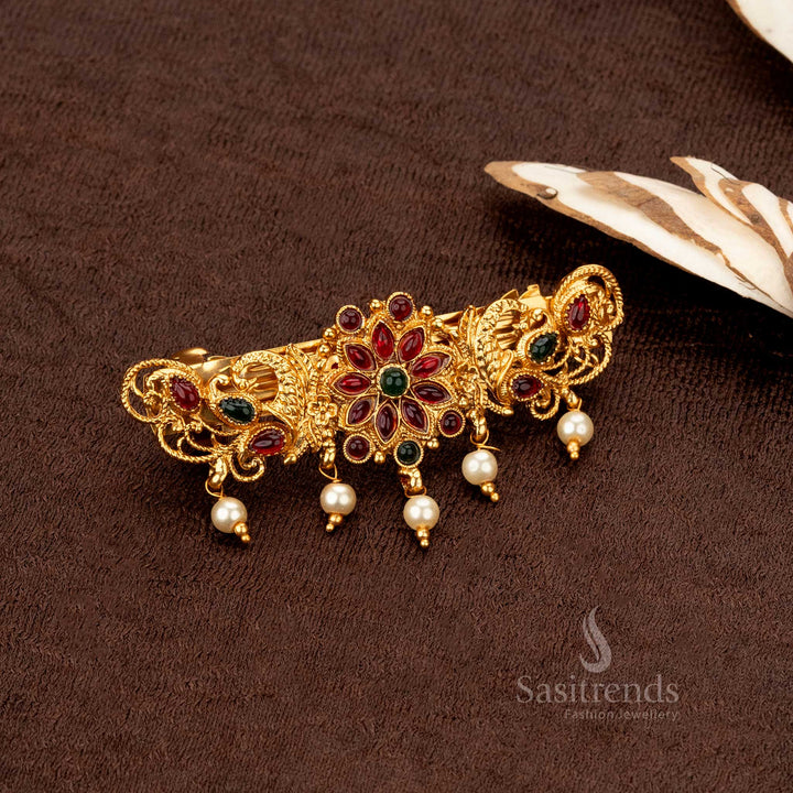 Antique matte gold temple hairclip with Lakshmi motif and filigree peacock detailing - Sasitrends