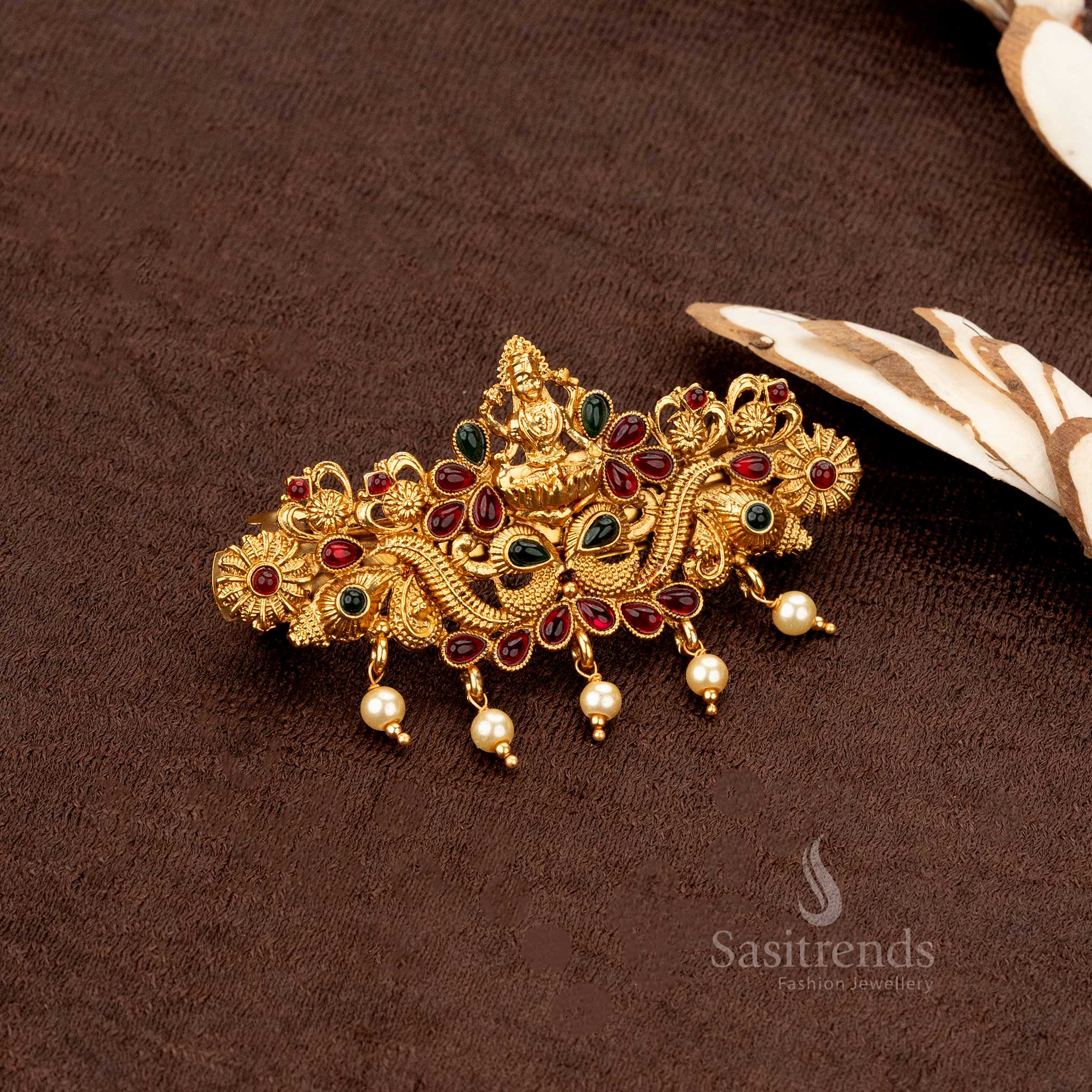 Matte gold-plated Lakshmi temple hair accessory with filigree detailing and pearl accents - Sasitrends