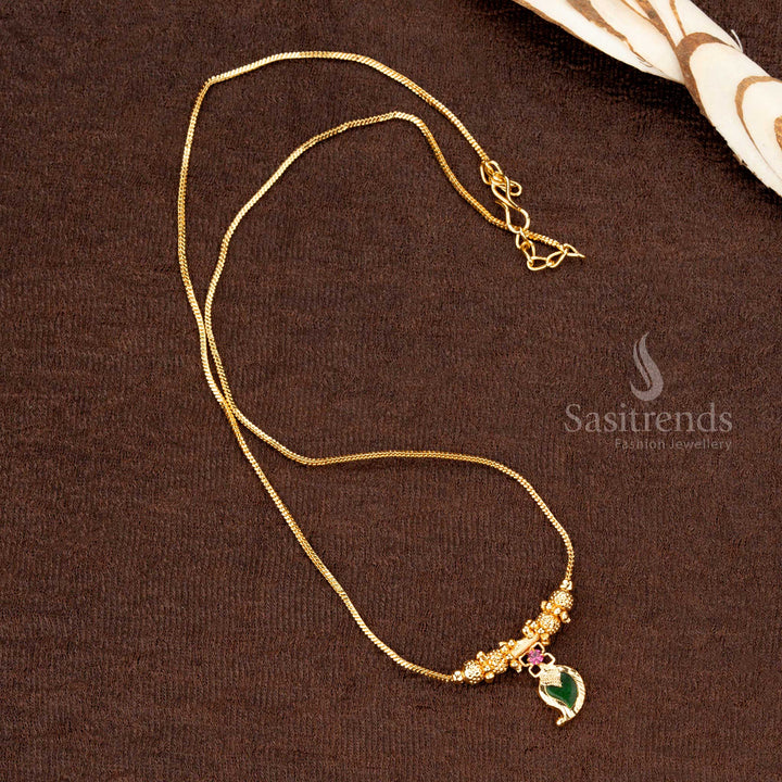 Enchanted glow Kerala traditional one gram micro gold plated green Palakka necklace, adorned with ornate ball details and a mango motif pendant - Sasitrends