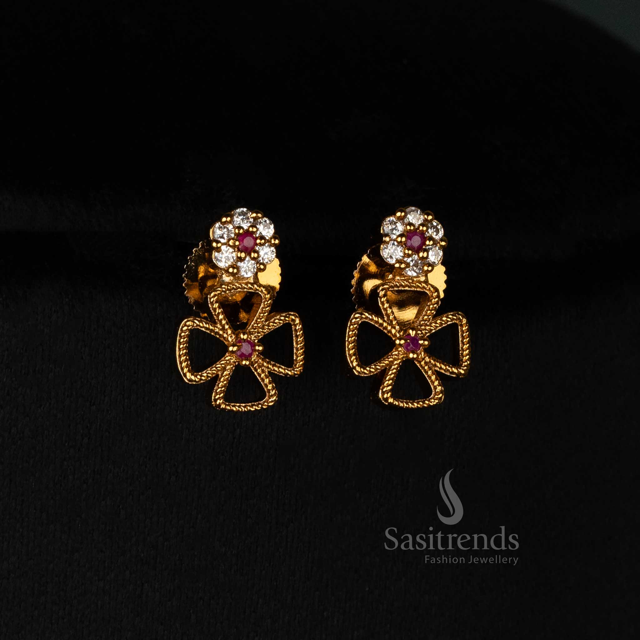 Royal matte gold plated floral clover earrings set with exquisite white-ruby AD stone detailing and stunning jewellery design - Sasitrends