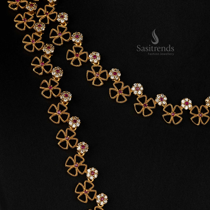 Majestic floral clover matte gold plated long and short necklace set adorned with sparkling white-ruby AD stones  - Sasitrends